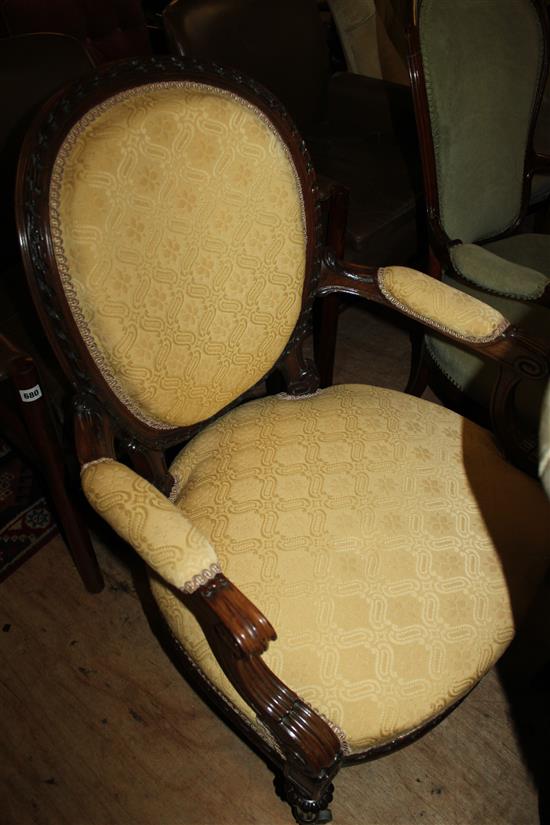 Early Victorian carved rosewood open armchair,